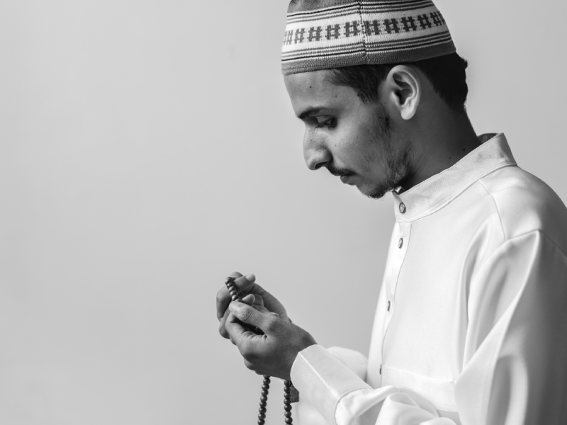 Muslim man praying salah
